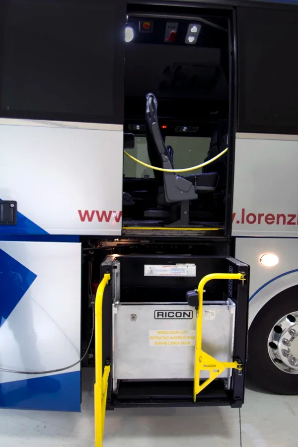 Lorenz Bus Service motorcoach with deployed wheelchair lift platform at side entry door