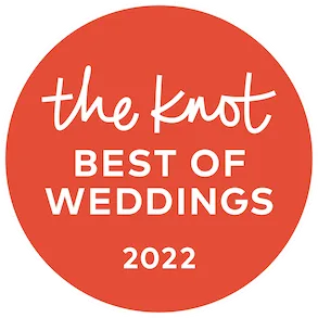 The Knot Best of Weddings 2022 circular badge awarded to Lorenz Bus Service on orange background