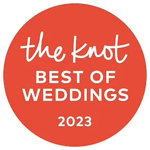 The Knot Best of Weddings 2023 circular badge awarded to Lorenz Bus Service on orange background
