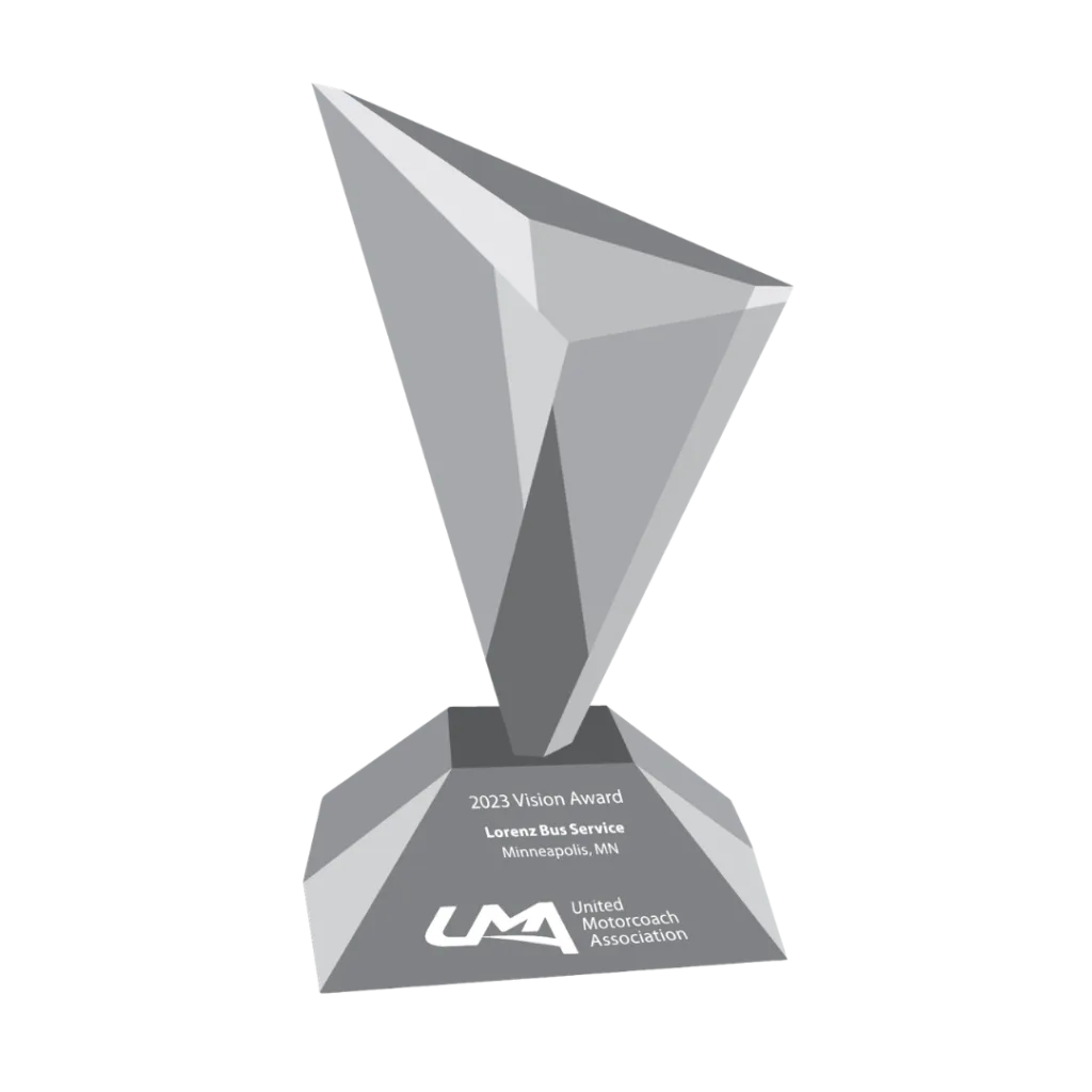 Crystal Twin Cities Business Family Business Awards 2025 Honoree trophy presented to Lorenz Bus Service
