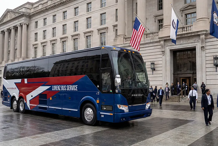 Lorenz Bus Service Prevost motorcoach parked in front of a government building in Washington, D.C